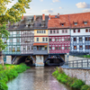Colorful buildings bring the medieval Krämerbrücke to life.