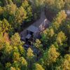 A forest hideaway Vrbo, nestled among towering pine trees in Broken Bow