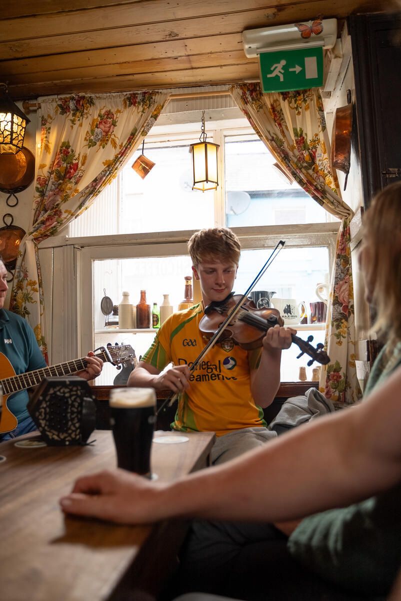 Grab a pint a local pub and you might stumble upon an Irish trad session.