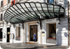 A doorman in front of the Baglioni Hotel Regina in Rome