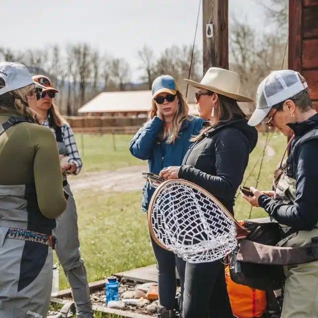 Lindsay Kocka with a Wade Well retreat group gather with their fishing kit