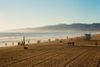 Make like Mitch Buchanan and jog along the water’s edge—or join the LA locals for a game of beach volleyball