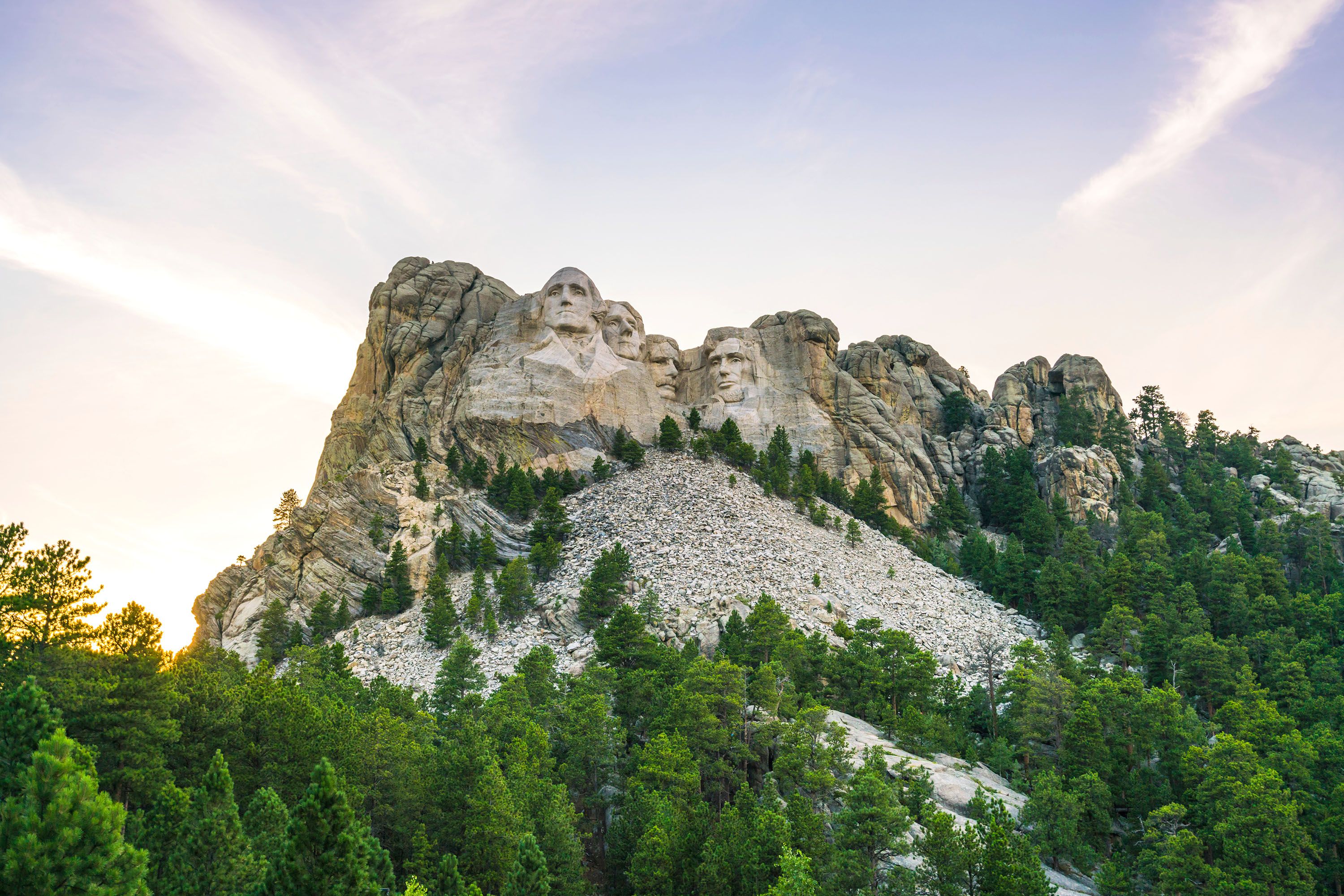 Former presidents' features carved into the Mount Rushmore.
