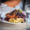 A beautifully presented plate of duck schnitzel at Otto’s German Bistro