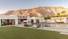 A luxury villa by a pool in Palm Springs, with mountains seen in the background