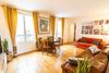 A comfortable and stylish living room in a Paris Vrbo