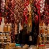 Spices and dried chilis at La Boqueria market in Barcelona, Spain