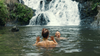 Chef José Olmedo Carles Rojas and his wife Chevy Tyler swim around the Quebrada Bonita waterfall in Panama