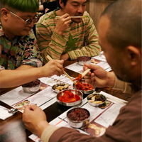 David Chang with Rekstizzy from Netflix show Beef and K-rapper Dumbfoundead at a Korean restaurant