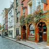 A green and orange tiled pub in Dublin, Ireland