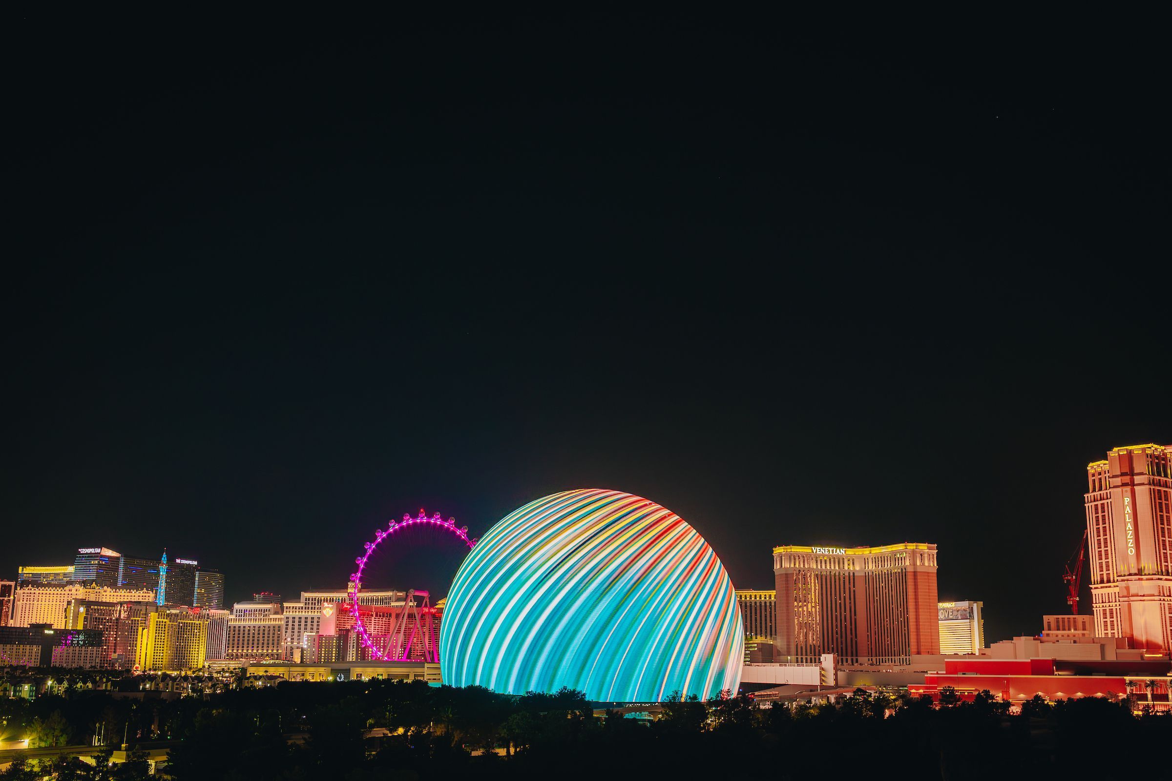 The Sphere arena lights up blue in the Las Vegas skyline in Nevada