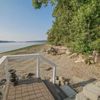 Steps down to the lake front beach at a Vrbo in Washington State