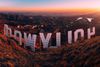 A sunset view of the hollywood sign from above.