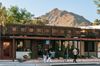 Strolling through Old Town South Scottsdale with a stunning mountain backdrop in Scottsdale, Arizona.