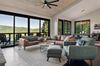 The modern living room of a Vrbo with views of Black Mountain, NC