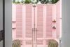 The pink-walled outdoor shower