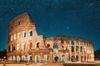 The Colosseum in Rome during nighttime with stars in the sky.
