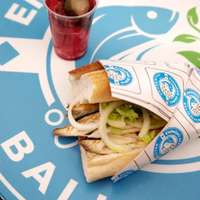 A grilled fish sandwich in a baguette at Eminönü Balık Ekmek, Istanbul