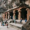 Visitors explore the 7th-century Hindu cave temples on Elephanta Island in India