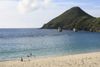 People paddle in the calm waters of Isso Beach on Yakushima Island in Japan