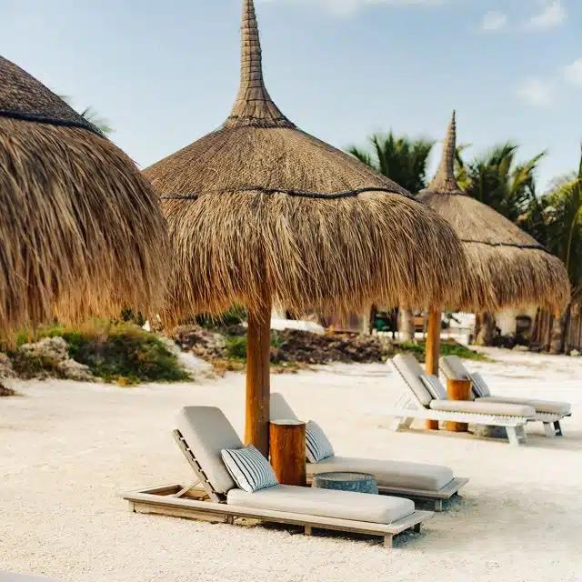 Sunloungers on the private beach at eco-conscious Las Nubes de Holbox