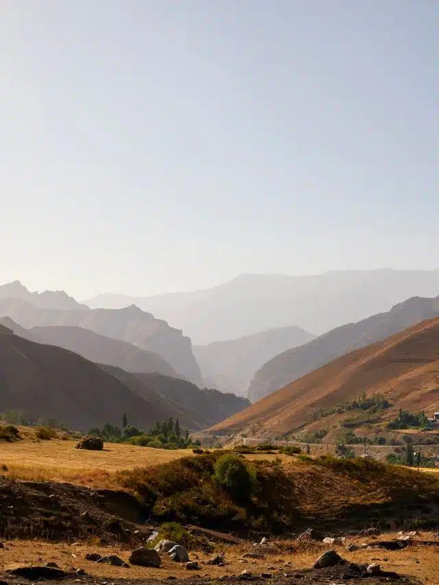 The Pamir Mountains fade into the distance outside of Qal’ai Khumb, Tajikistan