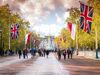 Road lined with British flags leading to Buckingham Palace.