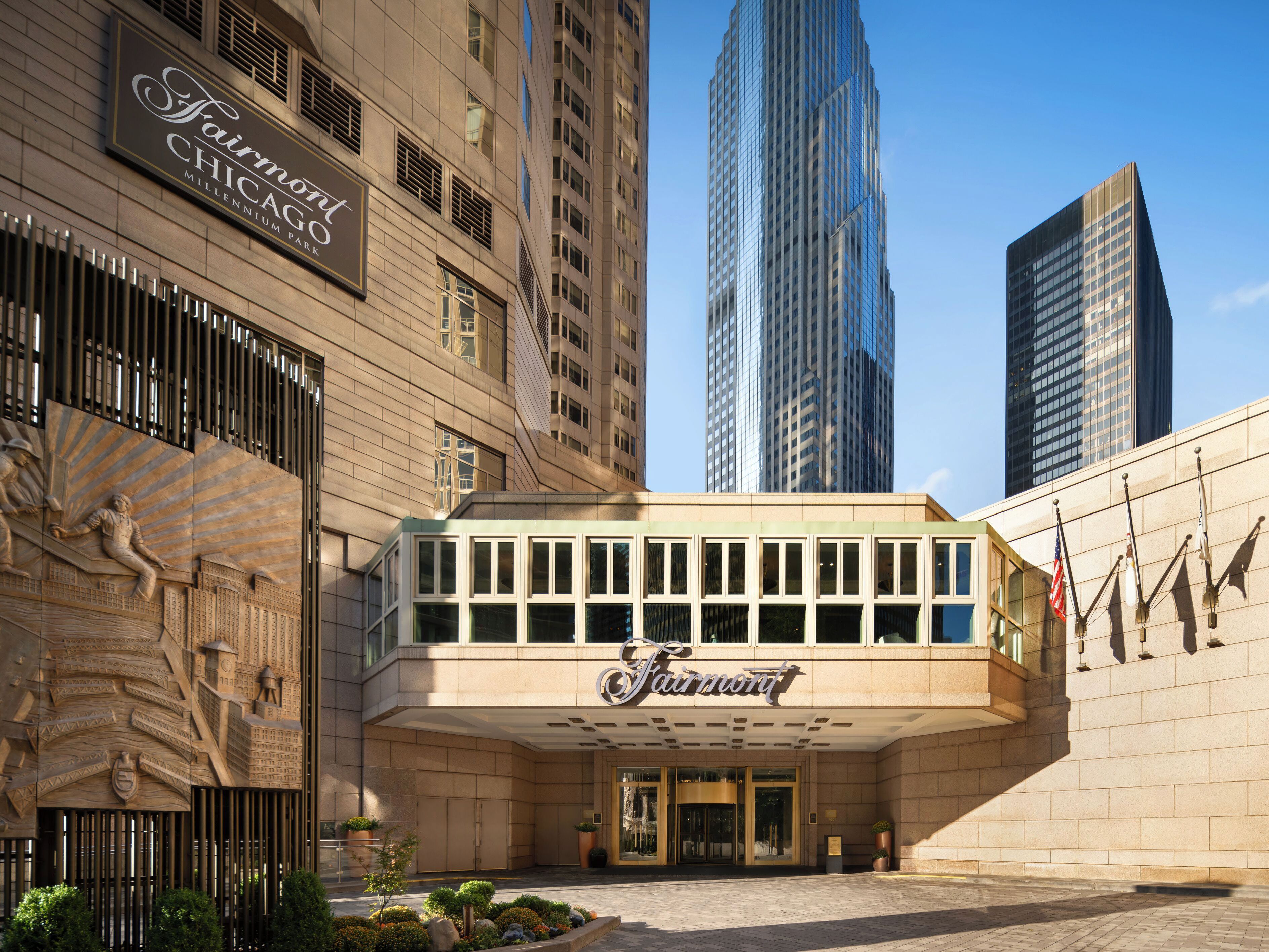 An exterior view of a hotel in a city.