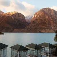 Over-water pavilions with glass walls on the side of Iskandarkul, or Alexander the Great Lake, Tajikistan