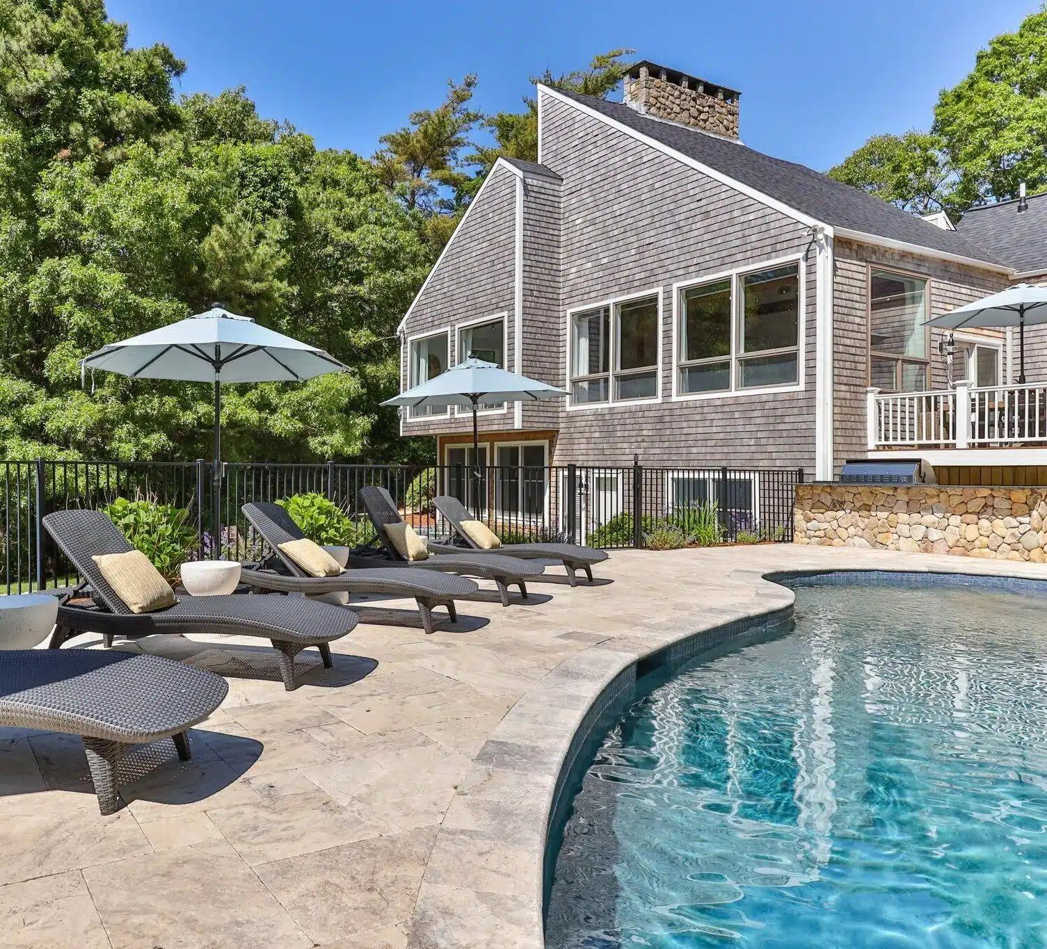 The backyard pool of a Vrbo in Cape Cod