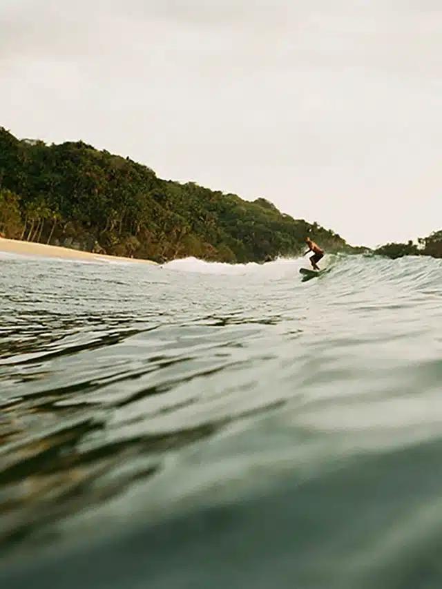 A surfer on a wave at San Pancho, Mexico