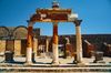 Old arch ruins stand tall in Pompeii, Italy.