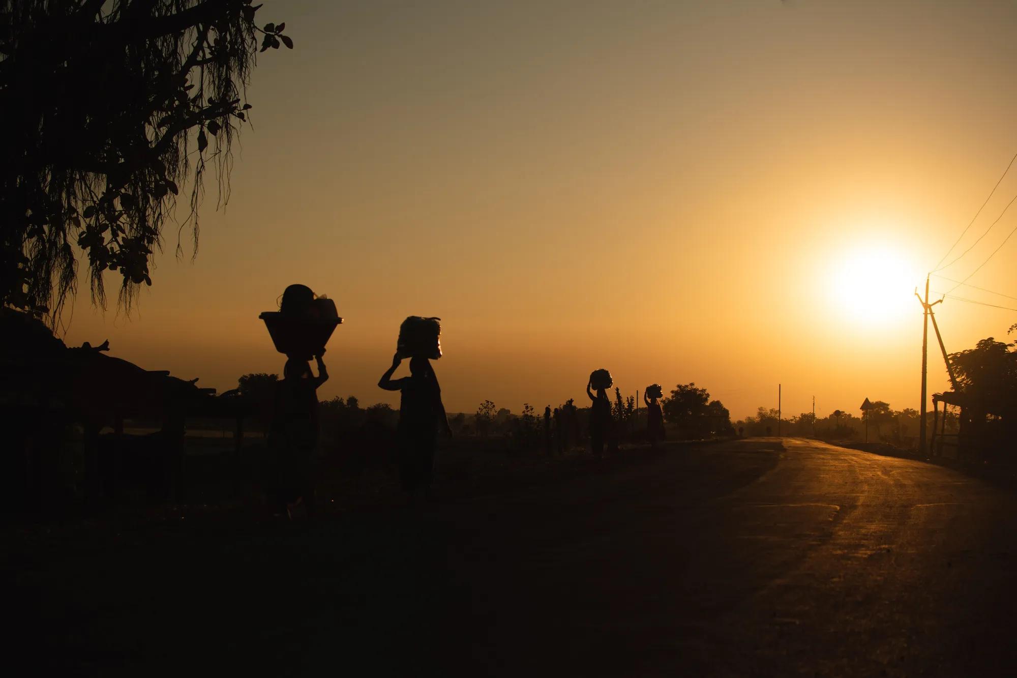 Young women walking home together after dark