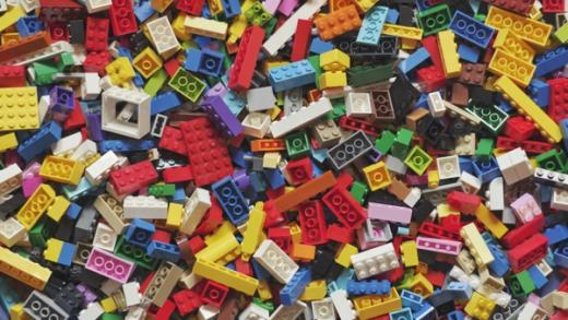 Many scattered colorful Lego bricks.