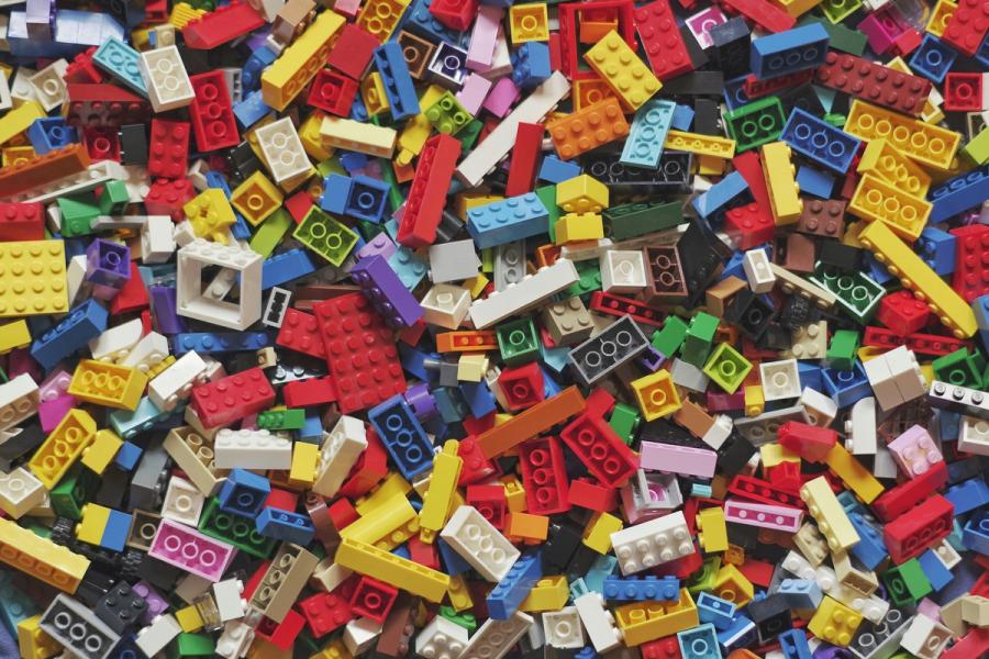 Many scattered colorful Lego bricks.