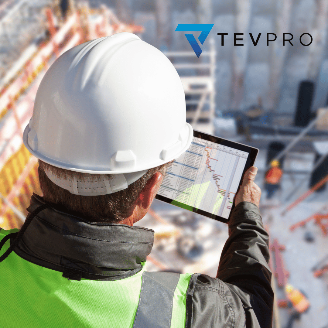Construction worker Technology Mobile App in hand