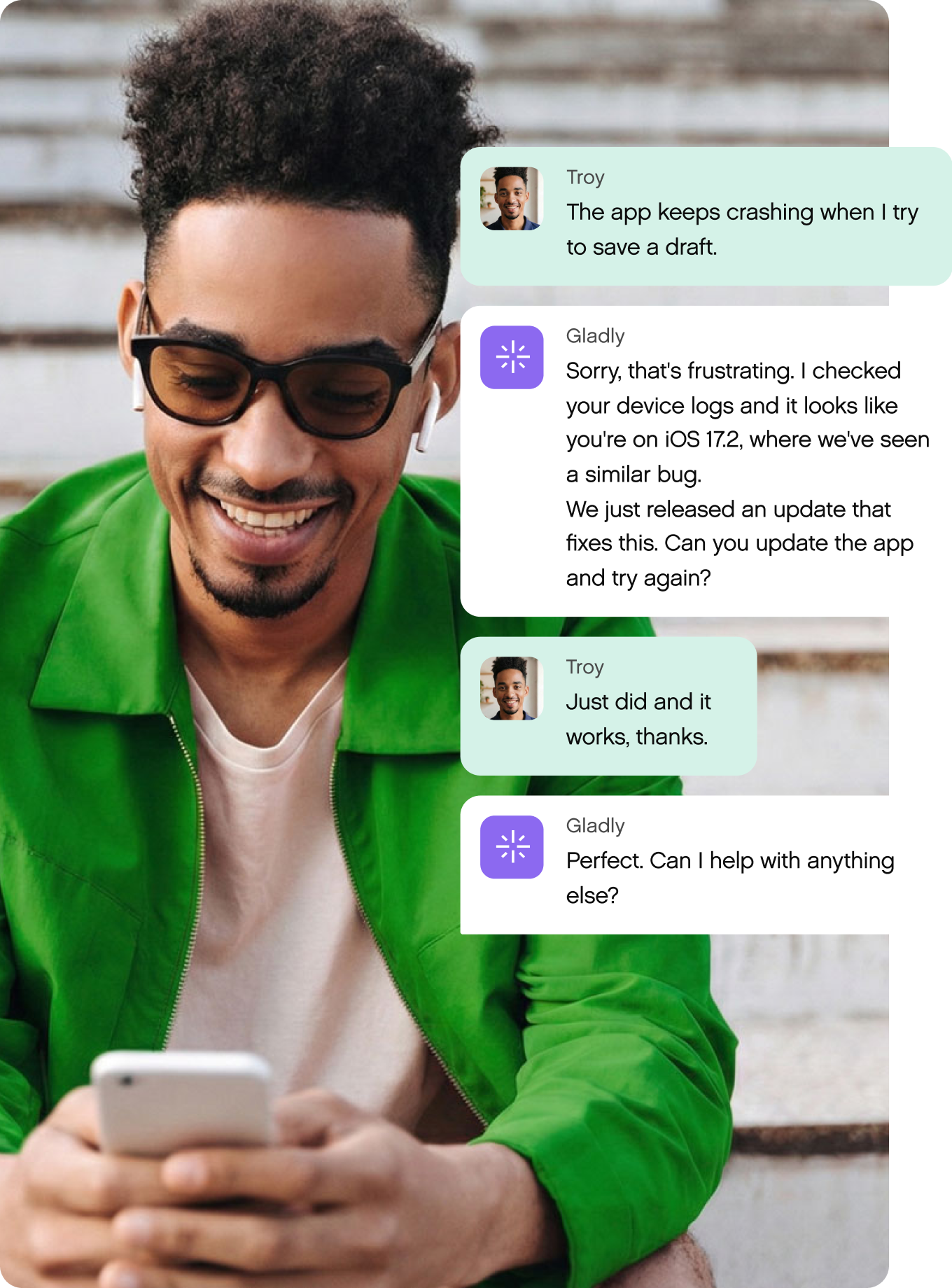 A smiling man in a green jacket sits on steps using a smartphone. Chat messages beside him discuss resolving a tech issue. Tone is positive and relieved.