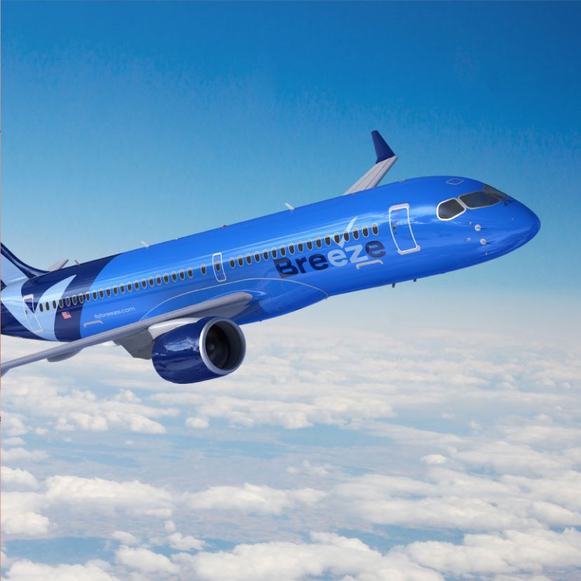 Blue airplane with "Breeze" logo flies above clouds against a clear blue sky, conveying a sense of modernity, speed, and freedom.
