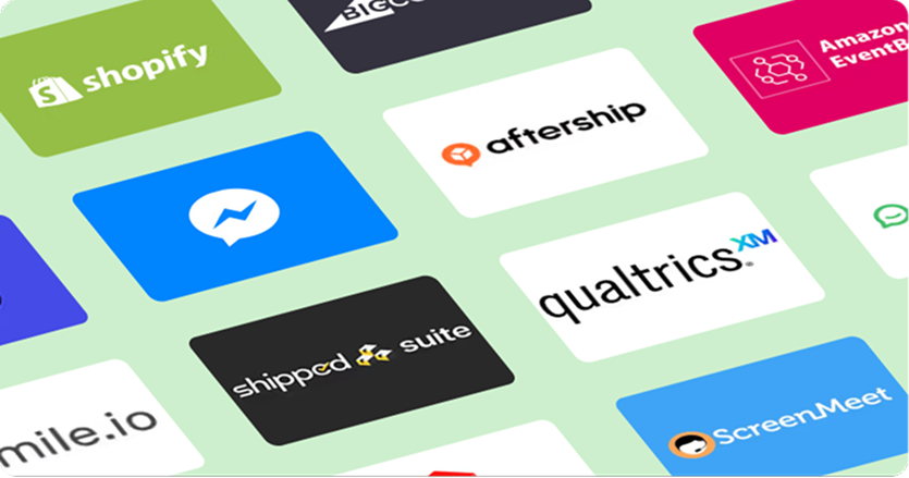 A grid of various company logos on white and colored backgrounds, including Shopify, Aftership, and Qualtrics, arranged on a light green surface.