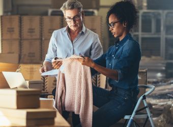 people looking at clothes