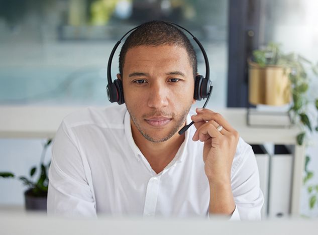 Man talking on a phone headset