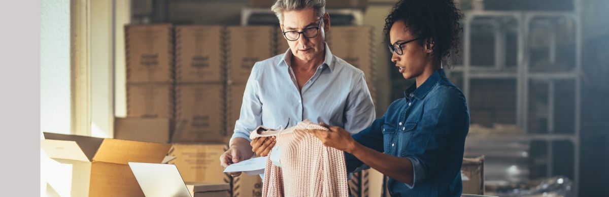 people looking at clothes