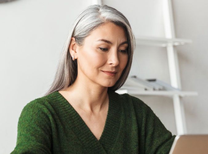 Older lady working on a computer