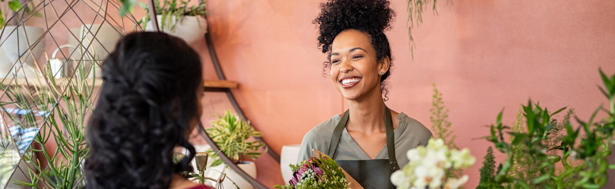 Customer purchasing a bouquet of flowers