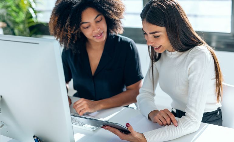 Two CX leaders measuring AI success in customer service