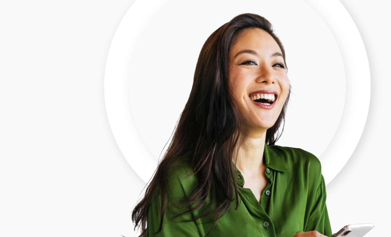 A smiling woman in a green blouse
