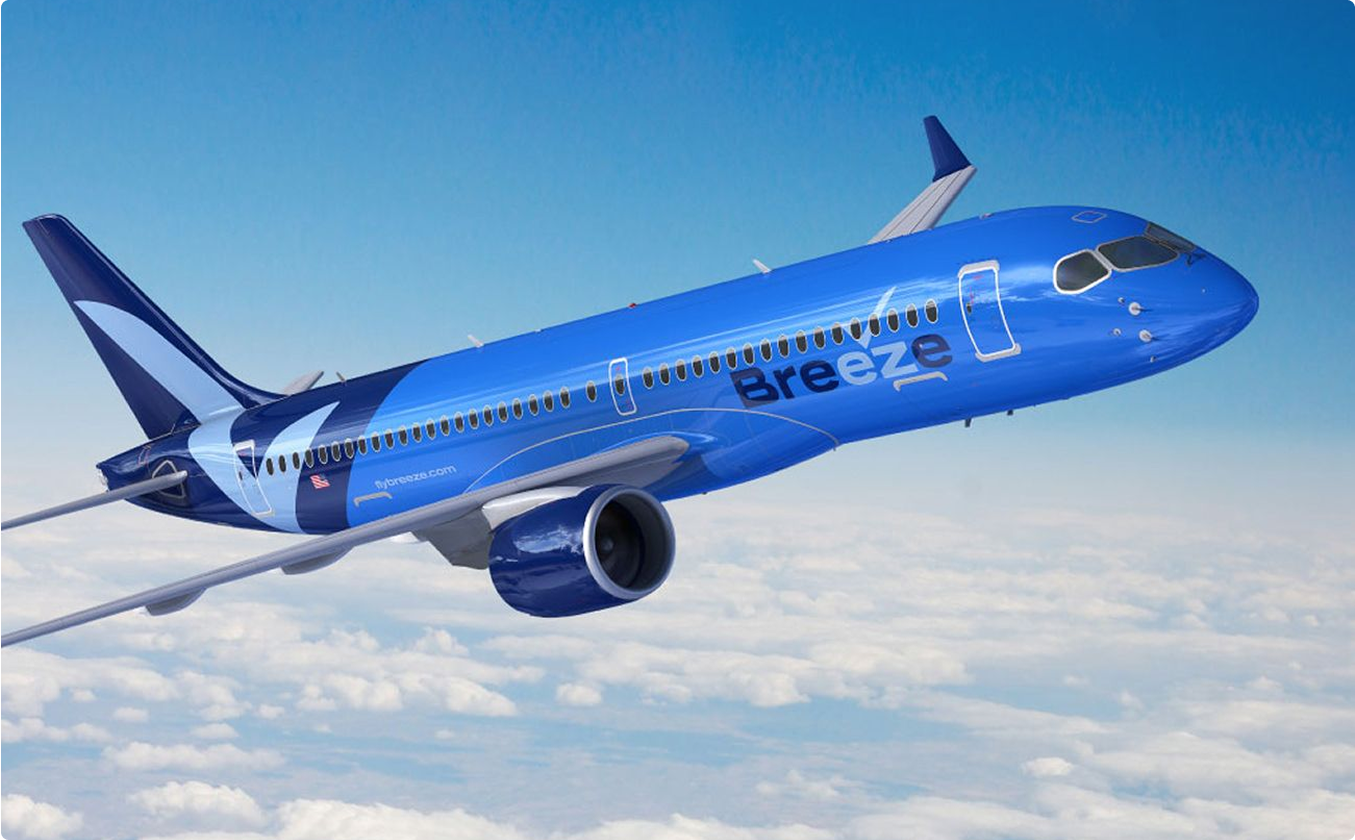 Blue airplane with "Breeze" logo flies above clouds against a clear blue sky, conveying a sense of modernity, speed, and freedom.