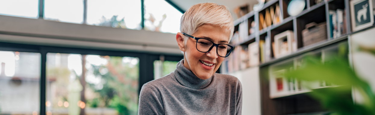 Elderly woman using laptop
