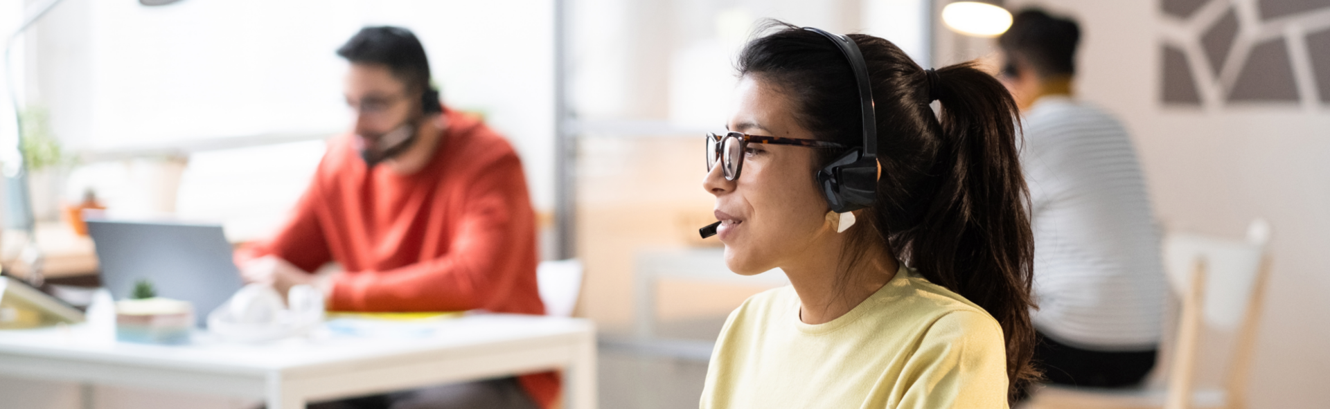 Customer service employee talking on a headset
