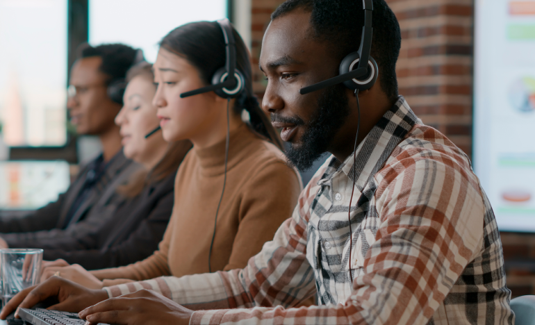 Four customer service reps at work